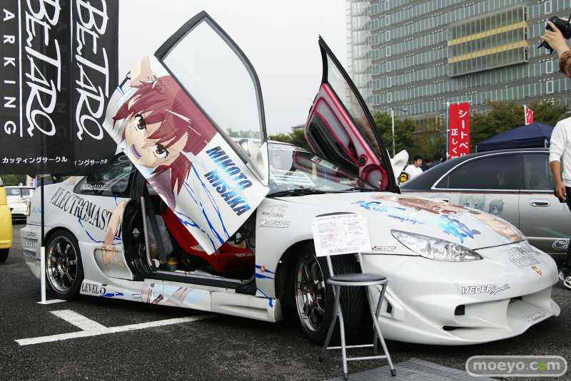 Illustration for article titled A Thousand Cars, Covered In Otaku Stickers